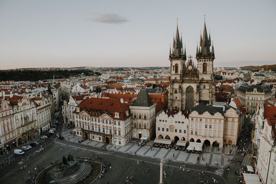 Captured from above, this image showcases Prague's iconic Old Town Square with historic architecture.