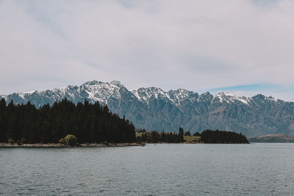 Experience the breathtaking scenery of Lake Wakatipu with the Remarkables mountain range in Queenstown, New Zealand.